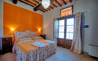 Granaio Apartment: chambre à coucher