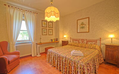 Villa Uccellaia: chambre à coucher