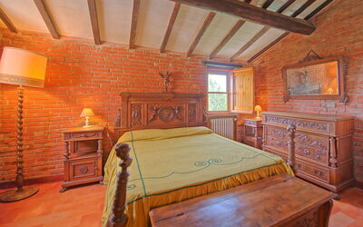 Villa Uccellaia: chambre à coucher