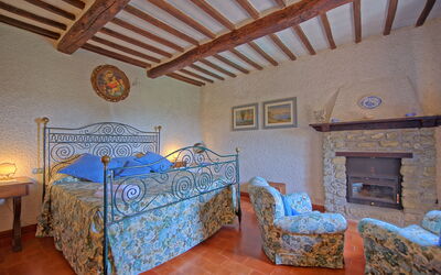 Villa Uccellaia: chambre à coucher