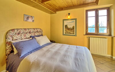 Villa Poggiospinoso: chambre à coucher