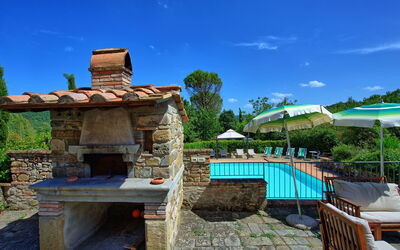 Casa Zaffiro: Tuin, zwembad