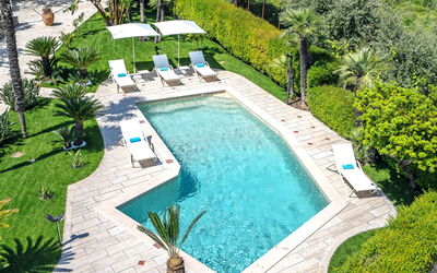 Le Statuette: Building Exterior, Garden, Outdoor, Pool