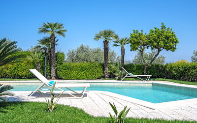 Le Statuette: Building Exterior, Garden, Outdoor, Pool